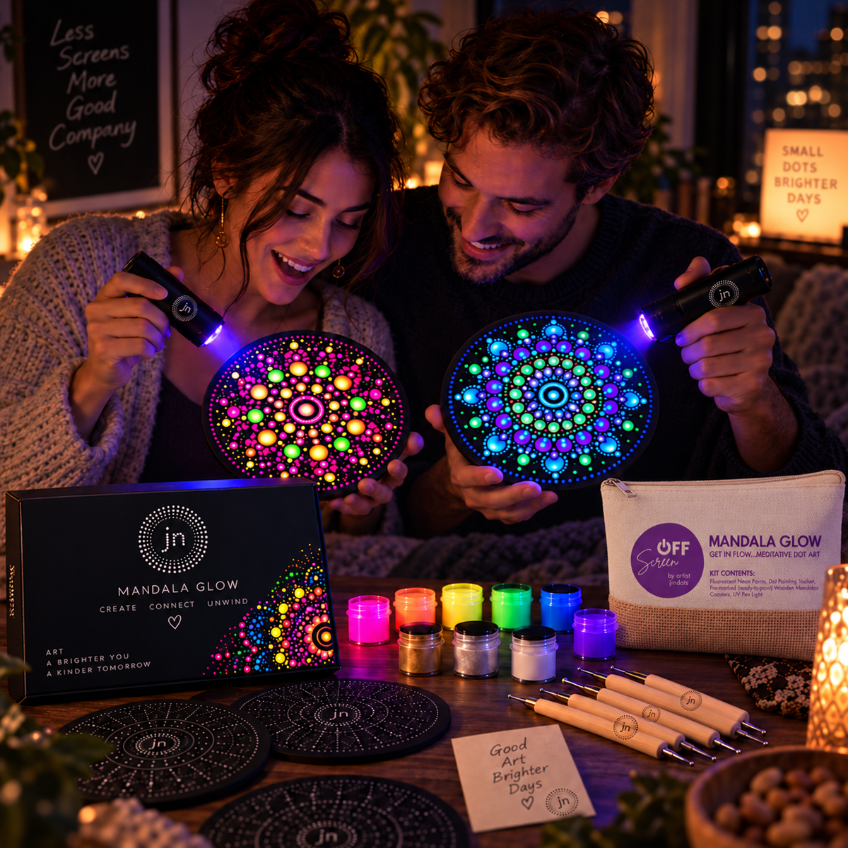 Couple revealing fluorescent Mandala Glow artwork under UV light